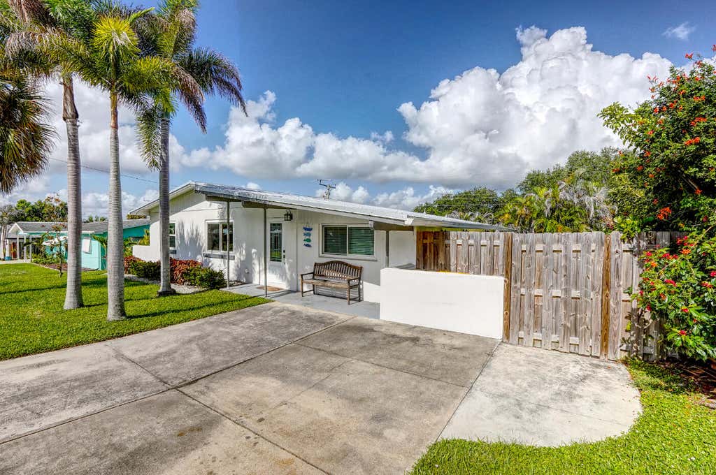 Photo of 3444 NE SANDRA Drive, Jensen Beach, FL 34957 (MLS # B26062935)