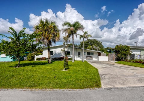 Photo of 3444 NE SANDRA Drive, Jensen Beach, FL 34957 (MLS # B26062935)