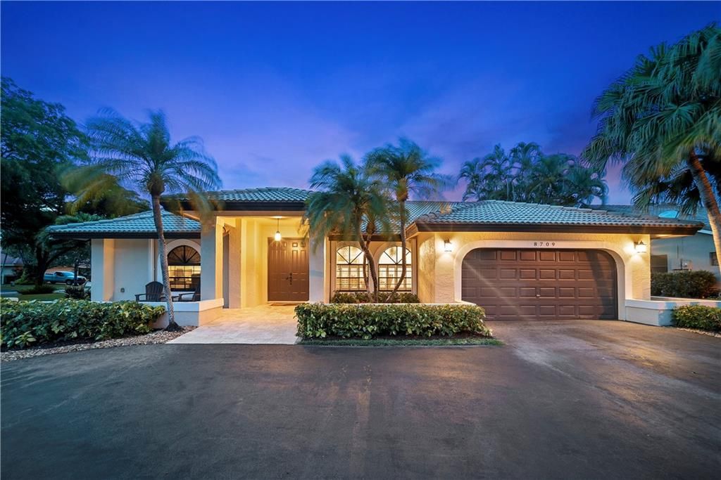 Photo of 8709 NW 52nd Pl, Coral Springs, FL 33067 (MLS # F10287186)
