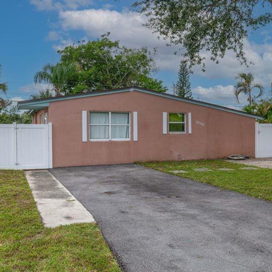 Hard to find a 3/2 in one of the best cities in Broward County for under $400,000. Margate is a wonderful city with great schools. The house is built like a duplex with 2 separate entrances. If you have a small family, you can live in the 2/1 and rent the other 1/1. There is a small room in the back of the house with washer and dryer. Everyone in the house has access to that room. House has driveways in 2 sides which together can fit at least 8 cars. The house is located in an area that is safe to raise a family. The house has huge backyard; big enough to play soccer or football. House is clean. Kitchen is nice. Living room looks great. Good size Bedrooms. The property in a wonderful neighborhood. Do not Walk, RUN before this property is gone. Showing by Appointment only. NO ASSOCIATION.