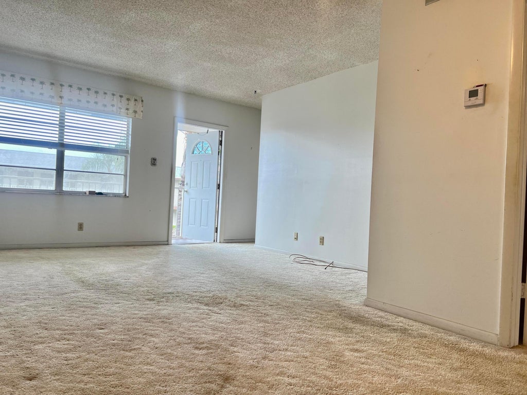 Photo of 601 NW 78th Terrace #205, Margate, FL 33063 (MLS # B26083130)