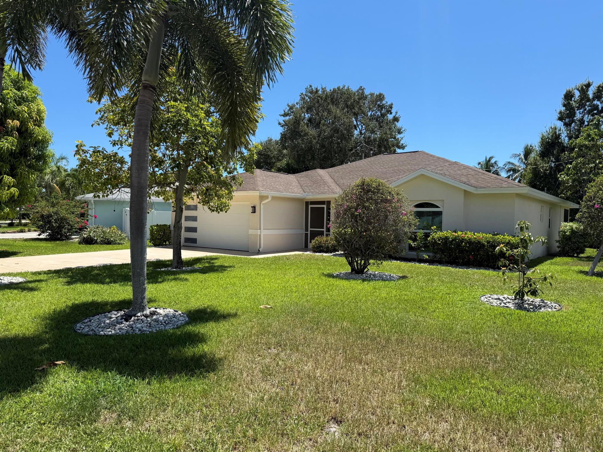 Spacious 3BR/2BA home on a peaceful street in a well-sought-after Tequesta neighborhood. Vaulted ceilings and crown molding, the open kitchen flows seamlessly into the great room and dining areaa"perfect for entertaining. Outside, enjoy a beautifully landscaped yard with room to relax or host gatherings. Just minutes from the ocean, Intracoastal Waterway, and top-rated schools. No HOAa"move in and embrace the best of coastal Florida living!