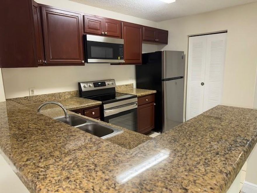 Spacious 2 bedroom / 2 bath unit in Coral Springs. Unit has been FRESHLY PAINTED and NEW STAINLESS STEEL
 APPLICANCES!! Unit features spacious kitchen with granite counter tops, lots of closet space, washer and dryer,
 large master bedroom and private guest bedroom with optional private bathroom. Unit has tiles throughout.
 ***2 MONTHS TO MOVE IN ONLY FOR prospects that are very qualified*** 1 pet ok - Gated Community.
 Community features clubhouse, pools, tennis courts and hot tub. Unit close to Coral Square Mall, major stores
 and restaurants and Highways. Unit located on the first floor - easy access no need to climb stairs!