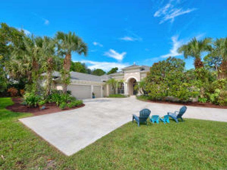 A breathtaking CBS Arthur Rutenberg home constructed in 2003 is situated on a very private one acre lot in a serene neighborhood east of I-95. This spacious 4 bedroom/4 full bath plus an office home features a flowing floorplan with dramatic 12' foot ceilings throughout the main living areas and master bedroom and bathroom. Large screened in lanai with heated swimming pool perfect for poolside grilling/entertaining. 3 car garage with workspace.  Home was painted Oct 2015.  Generator hook up and a fenced in yard.  Located in an A-Rated school zone.  This is a must see home!!

Owner/Agent