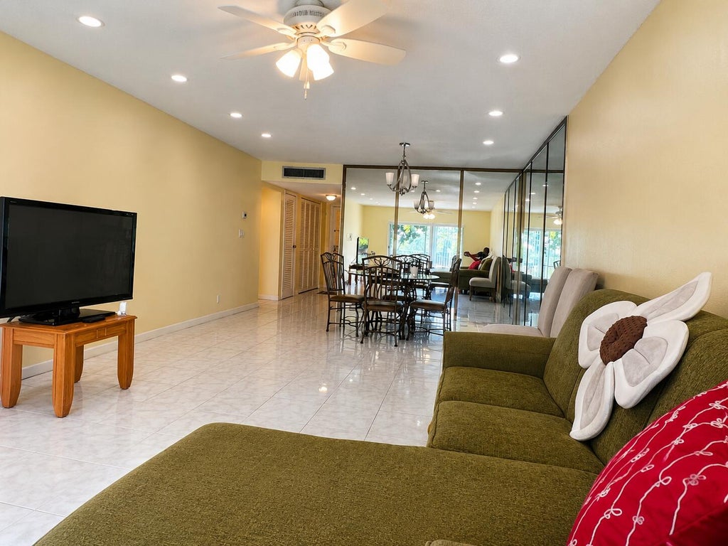Photo of 6101 N Falls Cir Drive #310, Lauderhill, FL 33319 (MLS # B26042656)