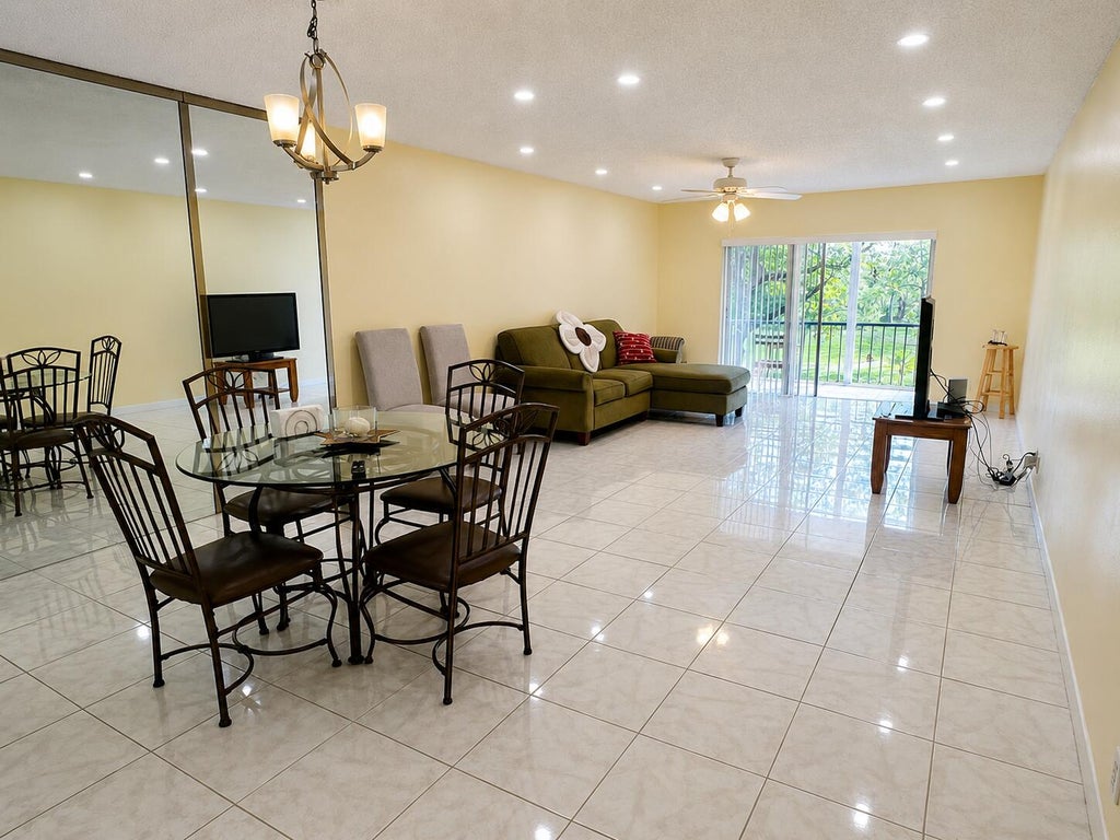 Photo of 6101 N Falls Cir Drive #310, Lauderhill, FL 33319 (MLS # B26042656)
