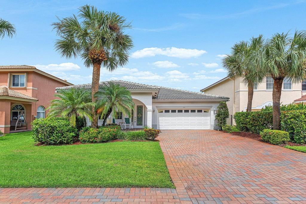 Photo of 310 VENICE Boulevard #310, Royal Palm Beach, FL 33411 (MLS # B26077717)