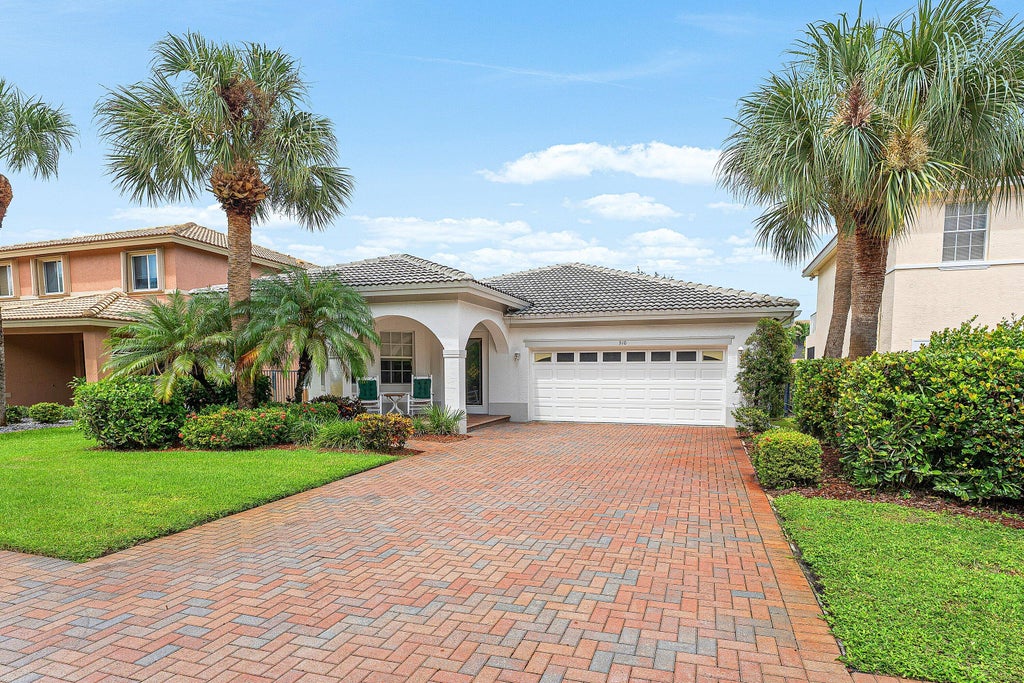 Photo of 310 VENICE Boulevard #310, Royal Palm Beach, FL 33411 (MLS # B26077717)