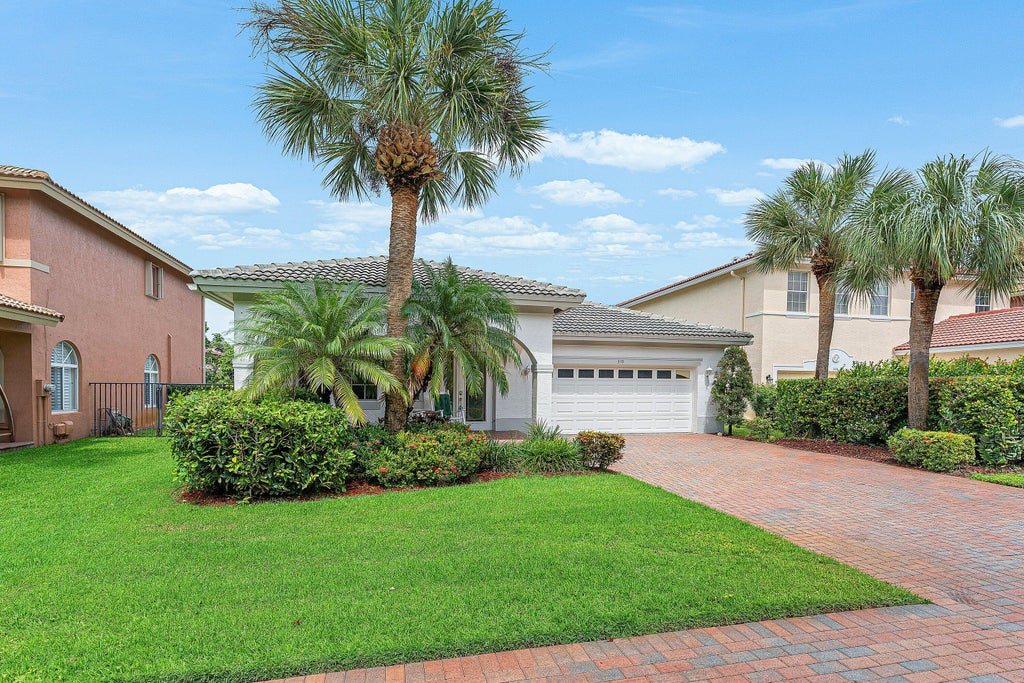 Photo of 310 VENICE Boulevard #310, Royal Palm Beach, FL 33411 (MLS # B26077717)