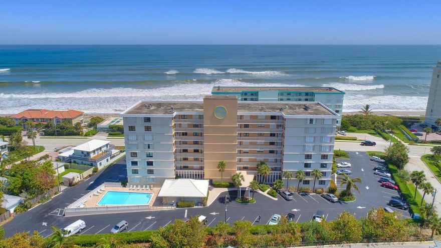 Welcome to this spacious and updated 3/2 condo, just steps to the beach with great ocean views! Featuring a spacious master ensuite bath and custom closet, a kitchen with stainless steel appliances and granite counter tops and a wet bar with a beverage and wine cooler. Almost every room has an ocean view including the 3rd bedroom which has been converted into an office space with custom built in cabinets and wood flooring. This property is bright with impact windows and sliders on the North, East & West sides. Other features include custom window shades, crown molding, a premium garage space and 2 storage units. Great walkability to restaurants, shops, pier and Pelican Lake. Come see this fantastic property in charming Juno Beach!