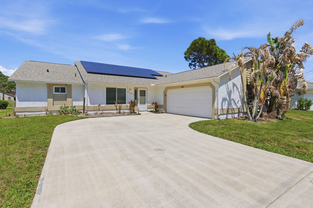 Photo of 2281 SE Bowie Street, Port Saint Lucie, FL 34952 (MLS # B26026988)
