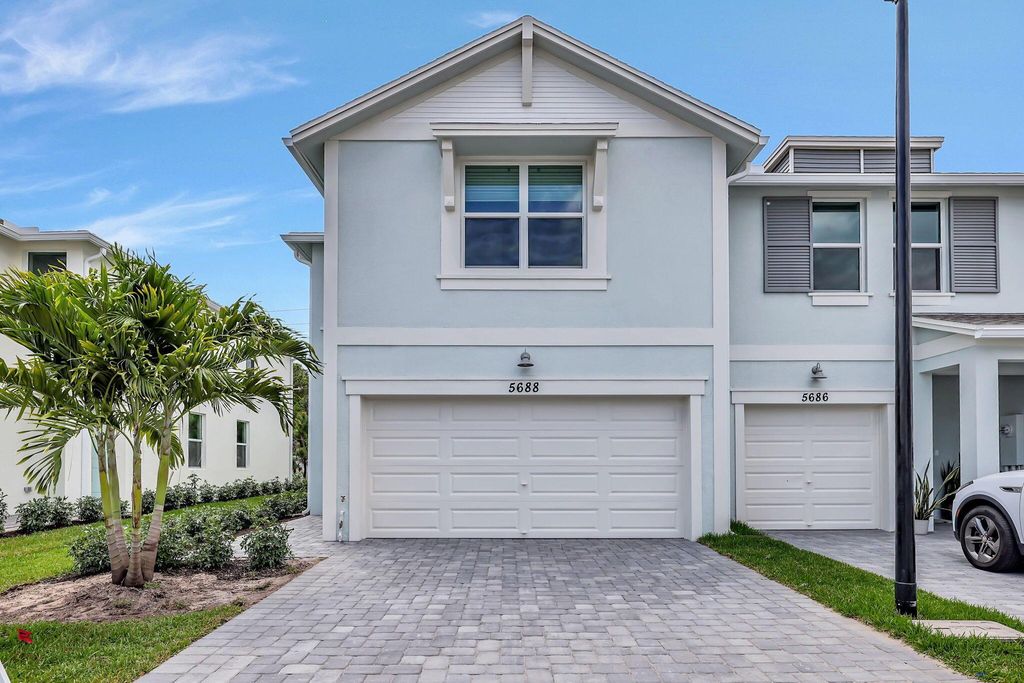 Photo of 5688 SE Edgewater Circle, Stuart, FL 34997 (MLS # R10975210)