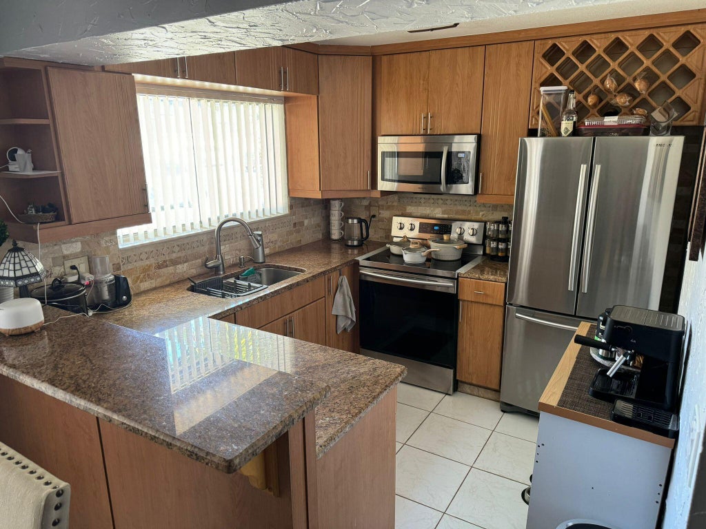 Photo of 5288 BOSQUE Lane #53, West Palm Beach, FL 33415 (MLS # B26067959)