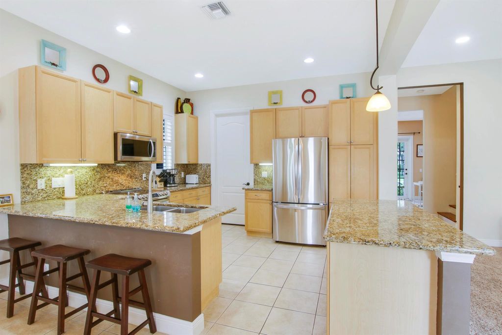 Photo of 108 Spikerush Road, Jupiter, FL 33458 (MLS # R11037284)