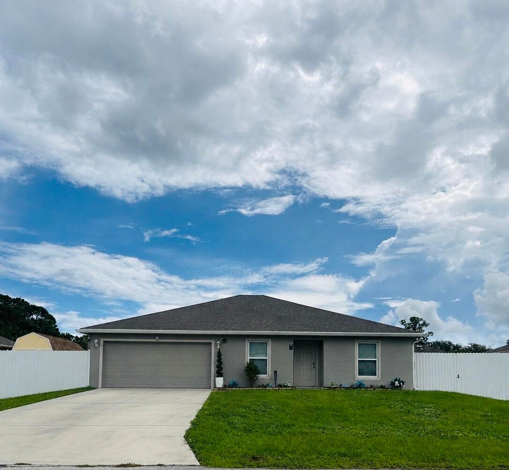 Photo of 2373 SW BARBER Lane, Port Saint Lucie, FL 34984 (MLS # B26071716)
