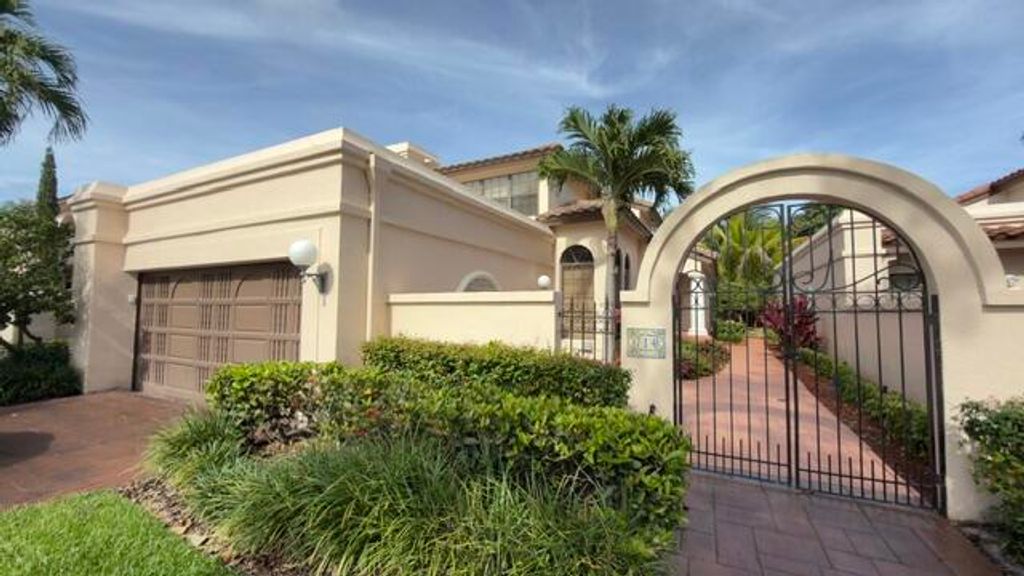 Photo of 714 Deer Creek Via Genova, Deerfield Beach, FL 33442 (MLS # B26024722)