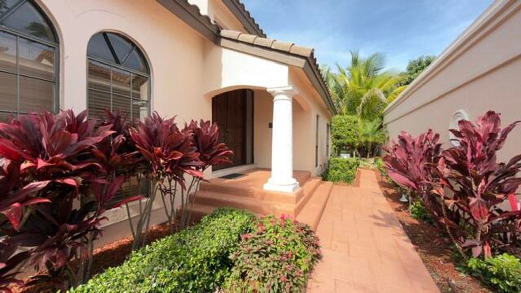 Photo of 714 Deer Creek Via Genova, Deerfield Beach, FL 33442 (MLS # B26024722)