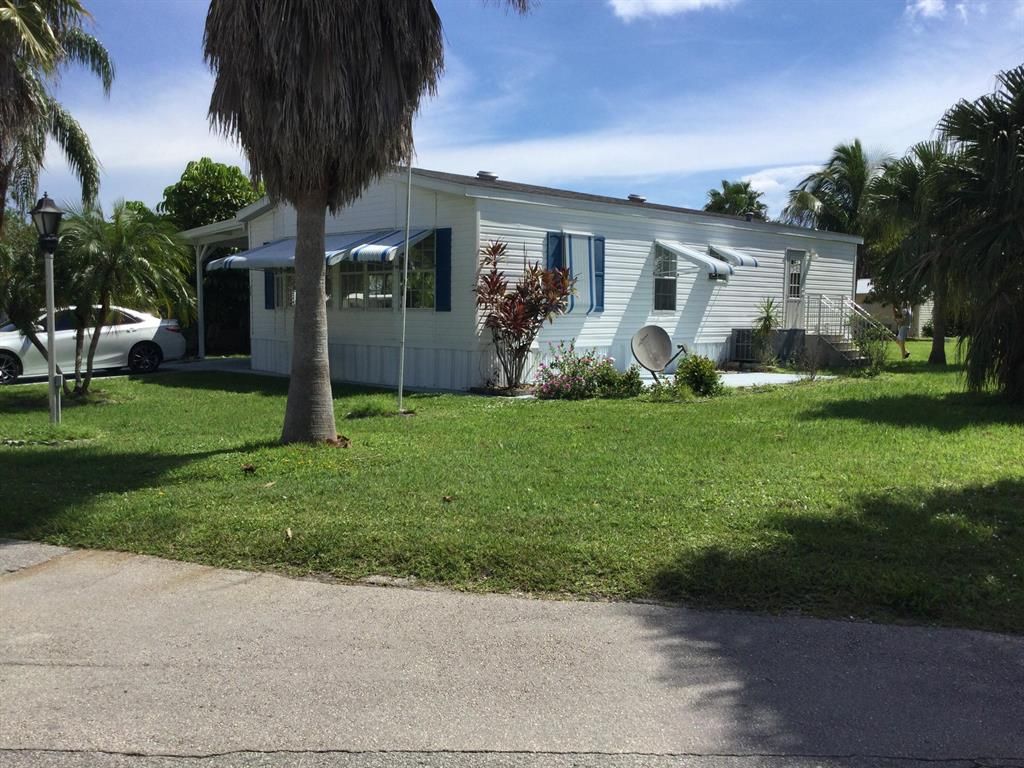 Photo of 46 Mediterranean Boulevard E, Port Saint Lucie, FL 34952 (MLS # R10746510)