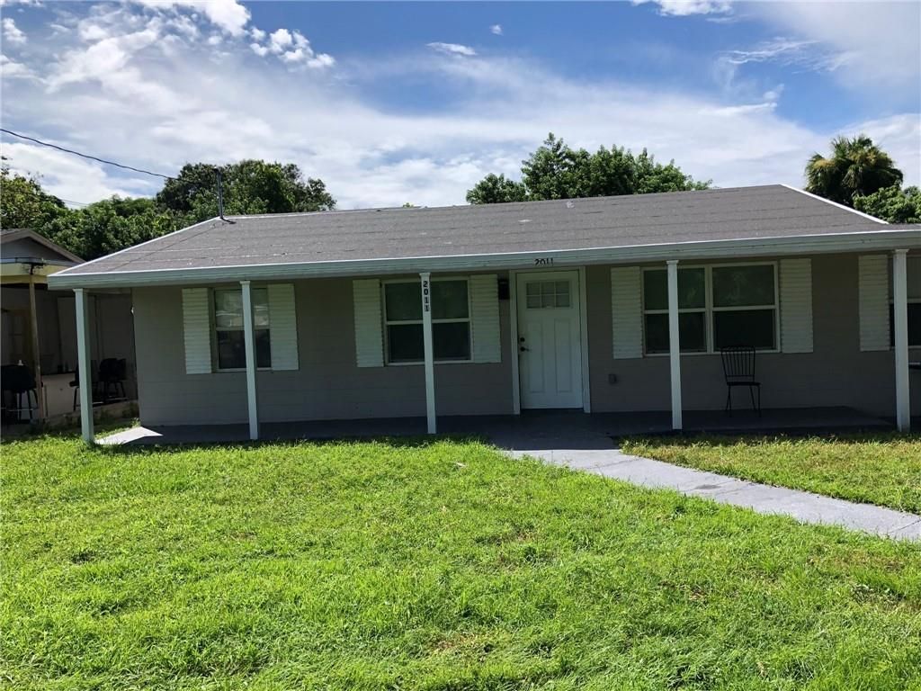 Photo of 2011 N 51st Ct, Fort Pierce, FL 34947 (MLS # F10300912)