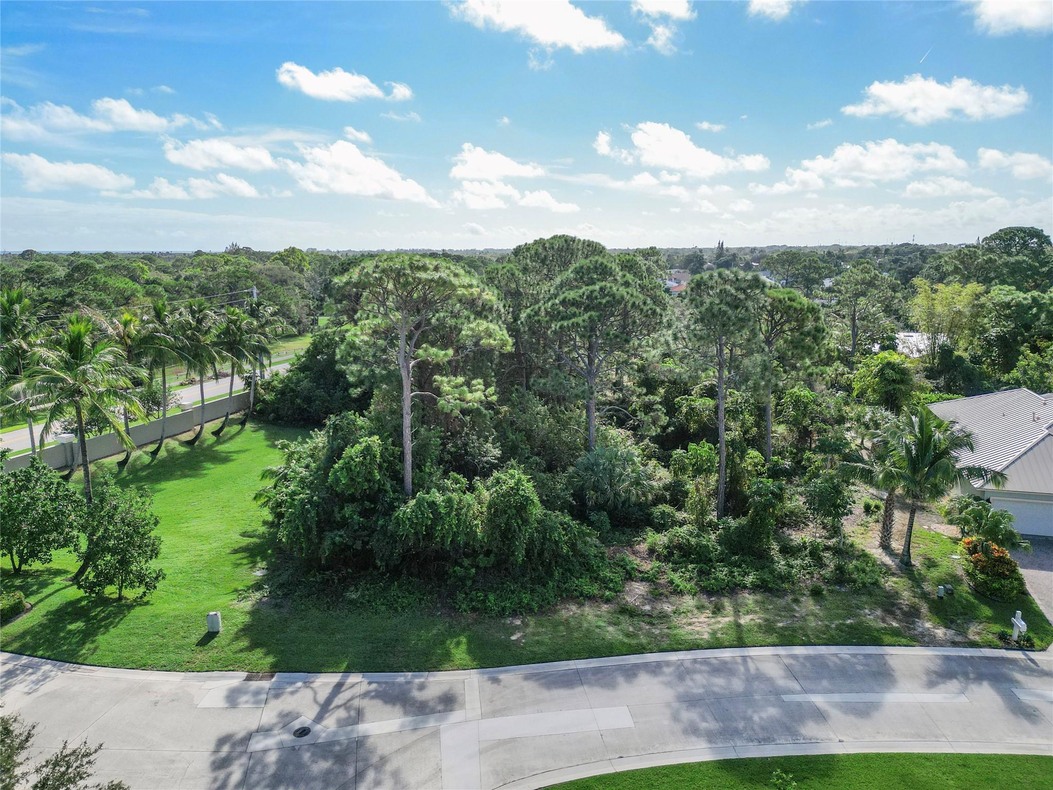 Attention Boaters! Build your dream home on a premium lot in the exclusive gated community of Bahia Sound. This lot includes an assigned 25-foot boat slip in the community's deep-water marina, offering easy access to the Intracoastal Waterway, Jupiter Island, Peck Lake, & the beach—all just moments away by boat. This highly sought-after lot is high and dry, soil-tested, and situated next to a green space with no neighbors to the east or south, providing extra privacy. Conveniently located near top attractions and dining in Hobe Sound, Downtown Stuart, and Jupiter, it's a perfect spot for your coastal lifestyle. House plans, a survey, and preliminary geotechnical engineering plans are available in the documents. OFFERING $7,500 TO CLEAR LAND!!!!