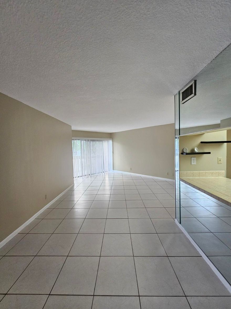 Welcome to this beautifully maintained and light-filled 1-bedroom, 1-bathroom condo in Presidential Golfview. Enjoy abundant natural light and tile flooring throughout, creating a bright and comfortable living space. Ideally located just minutes from Palm Beach International Airport, Palm Beach Outlets, downtown West Palm Beach, pristine beaches, renowned golf courses, shopping, and supermarkets,offering exceptional convenience and accessibility.