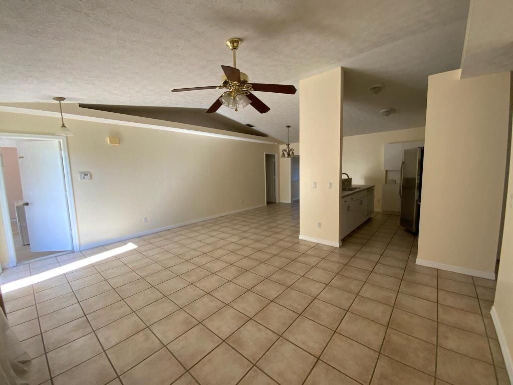 Photo of 971 SW Kappa Avenue, Port Saint Lucie, FL 34953 (MLS # R10951017)
