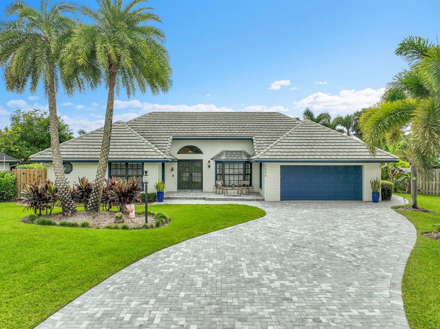 Frenchman's Fancy! Turnkey single story home w/Split floor plan. Featuring 4 Bedrooms, 2 Full Bathrooms. Vaulted Ceilings, Impact Windows, Hardie board siding, Luxury Vinyl Plank flooring. Cement tile roof (2021) New AC (2024), Tankless HWH (2022). Open kitchen concept w/White shaker-style cabinetry and newer granite countertops. Eat-in breakfast nook and top of the line, stainless steel kitchen-aide appliances. The Kitchen overlooks the Great room and features a wood burning fireplace. Formal dining room features Pecky Cypress Synergy wood ceilings. Owners' suite features renovated bathroom w/separate soaking tub & shower and huge walk-in closet. The backyard is fully fenced w/saltwater pool encased with Travertine Pavers. Covered Lanai features Pecky Cypress synergy wood ceiling