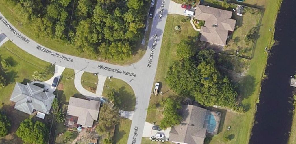 Photo of 2325 SE Rock Springs Dr, Port St Lucie, FL 34952 (MLS # F10395712)