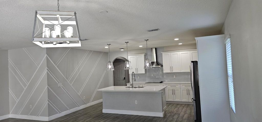 Photo of 1402 SW Bargello Avenue, Port St Lucie, FL 34953 (MLS # R11116212)