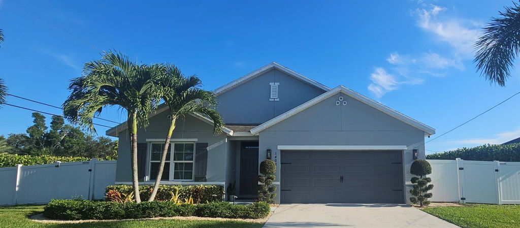 Photo of 1402 SW Bargello Avenue, Port St Lucie, FL 34953 (MLS # R11116212)