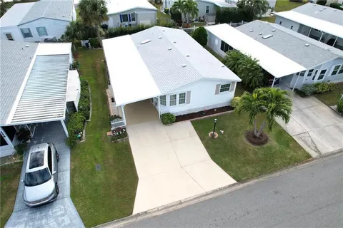 456 Dolphin Circle, Barefoot Bay, FL MLS: R11055365