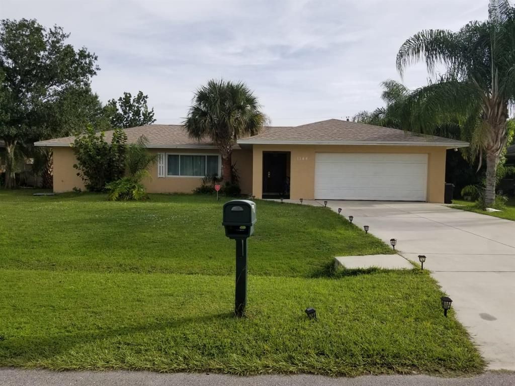 Photo of 1144 SE Palm Beach Road, Port Saint Lucie, FL 34952 (MLS # R10691004)