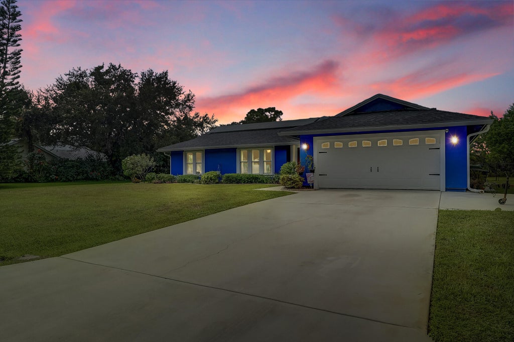 Photo of 3050 SE Bur Street, Port Saint Lucie, FL 34952 (MLS # R11118067)