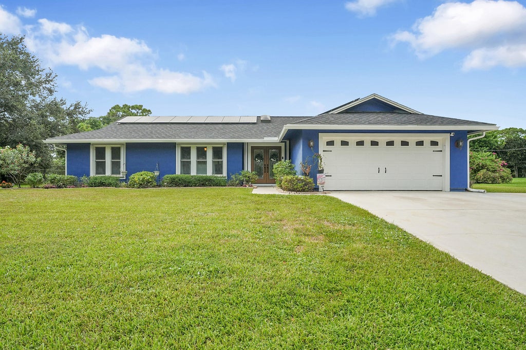 Photo of 3050 SE Bur Street, Port Saint Lucie, FL 34952 (MLS # R11118067)