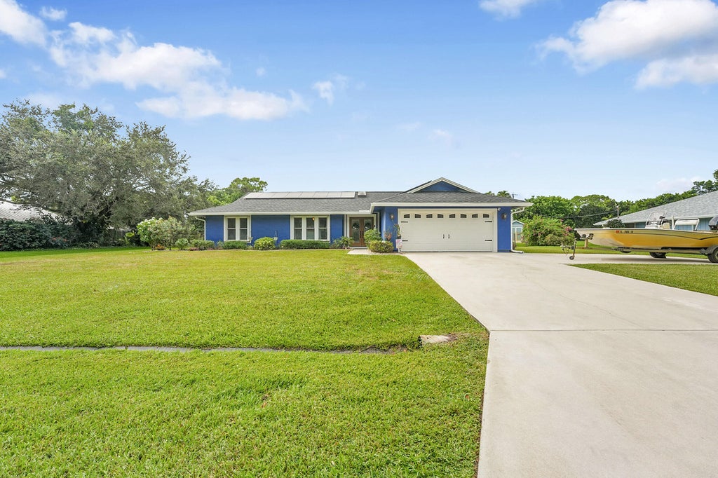 Photo of 3050 SE Bur Street, Port Saint Lucie, FL 34952 (MLS # R11118067)