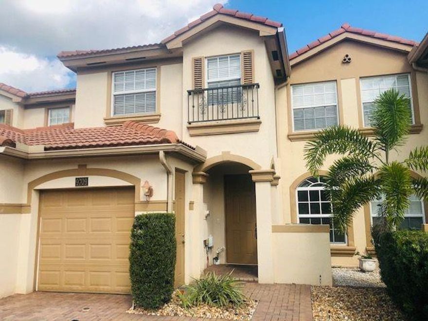 Move in Ready! WoW! True 4 bedrooms 3 full bathrooms: Largest layout in the community with 1 bedroom/full bath downstairs . Large master suite with walk in closet and sitting area. Brand News Stainless Steel Appliances, Brand New wood flooring upstairs. Large bath with double vanities, tub and shower upstairs. Brand New Washer and Dryer under air. 1 car garage and 2 car driveway. Hurricane ready with accordion shutters and some impact glass. Gated community, heated community pool. HOA provides basic cable and security. Located on Stirling Road just west of A-rated Cooper City HS and within a short walk of a Cooper City public park.Cooper City Dream!