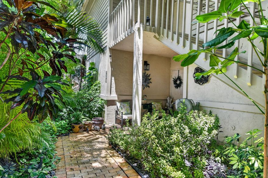 Rarely available first floor 3/2 condo in Southwinds at Boca Pointe.  Huge wrap around screened in patio with long lake views. Over 1,900 square feet of comfortable living space. This light and bright home features laminate flooring throughout the main living areas and bedrooms plus carpet in the primary suite. Updated primary bath is finished with newer cabinetry, quartz countertops, and stylish fixtures. 2nd  bathroom has also been updated and features a tub/shower combination. Kitchen offers granite countertops, stainless steel appliances, and replaced dishwasher, range, and microwave. Enjoy peaceful lake views from the patio complete with new fans, plus patio furniture included with the sale. Additional upgrades include impact windows, accordion shutters on the patios and more!