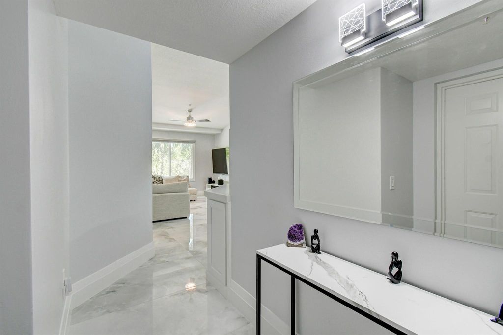 Photo of 117 Villa Circle, Boynton Beach, FL 33435 (MLS # R10961262)