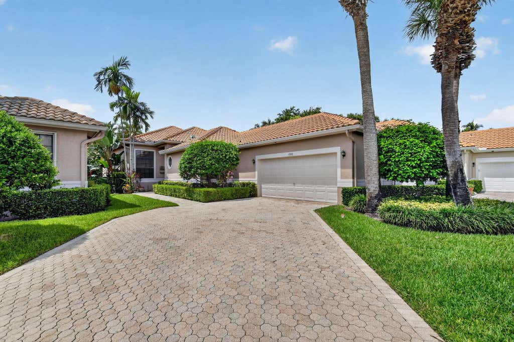 Photo of 4548 Barclay Fair Way, Lake Worth, FL 33449 (MLS # B26048222)