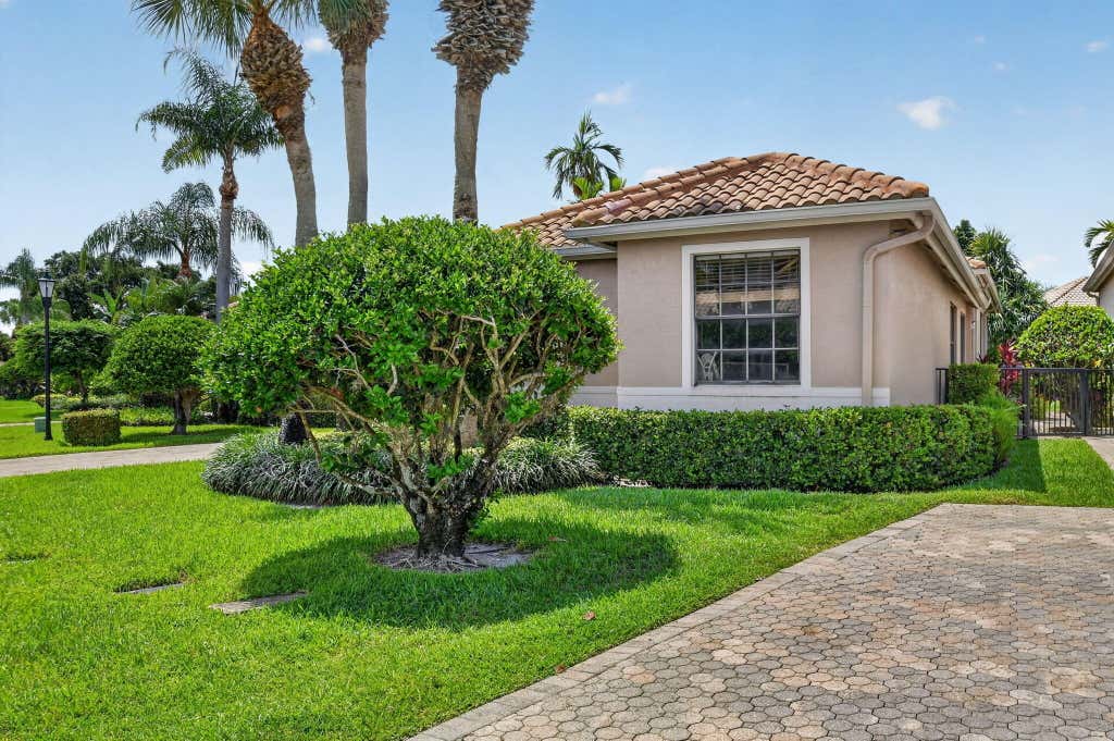 Photo of 4548 Barclay Fair Way, Lake Worth, FL 33449 (MLS # B26048222)