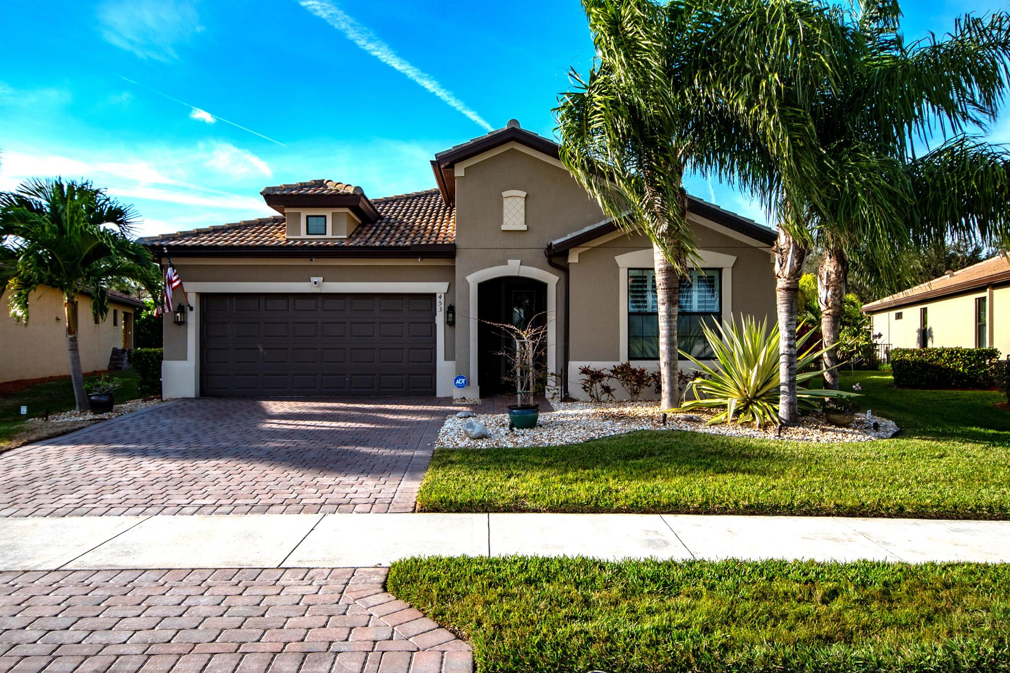 This home is amazing and immaculate. Superbly landscaped all around home and yard. Mint move right in condition. Island kitchen, upgraded cabinets with slide outs, granite counters. Complete home reverse osmosis water system. New floors throughout. Impact windows and doors. power screen in back patio. Make this yours today!