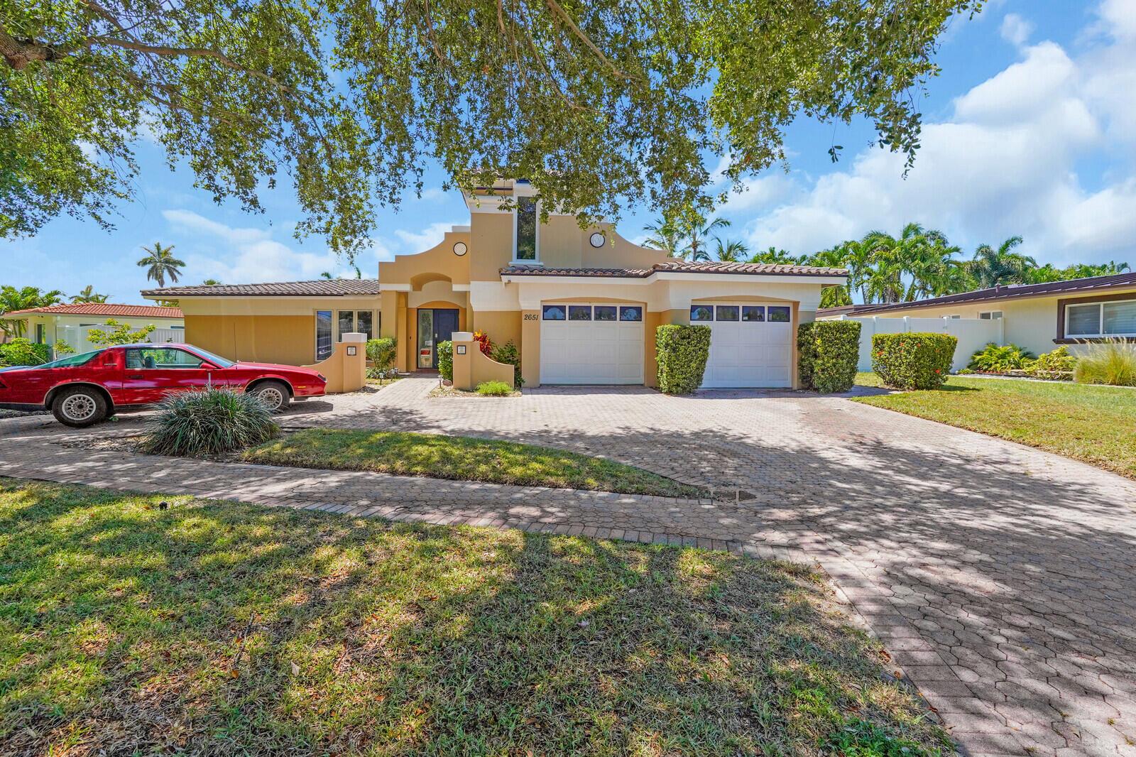 MOTIVATED SELLER!!!! Unlock the potential of this prime Lighthouse Point gem! Located east of Federal Highway on one of the neighborhood's most desirable streets, this 3-bedroom, 2-bath home sits on an oversized lot and is bursting with opportunity. Whether you're looking to renovate or invest, this property offers the perfect canvas in one of South Florida's most prestigious coastal communities. Just minutes from the marina, top-rated schools, shopping, dining, and pristine beaches. Don't miss your chance to create the dream home you've always wanted -- value like this in Lighthouse Point won't last long!