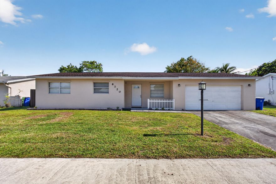 Tucked in a quiet Margate cul-de-sac, this NO HOA 3BR/2BA CBS home features a 2019 roof, 2-car garage and massive PET FRIENDLY fully fenced backyard with room for a pool. Featuring 1600 sq. ft. this single-story has an open floorplan to maximize space and the sizeable living area is versatile serving as a flex space for a kid's play area, game room or however you want to customize and make it yours! It flows into the eat-in kitchen and has tile/vinyl flooring throughout. Its new tankless water heater and newer roof make this home very energy efficient!  It has central AC throughout and a freshly painted exterior. Perfectly situated for an active lifestyle, just a short stroll to Firefighters Park's with lighted pickleball, tennis courts & basketball courts, a dog park, and walking trails.