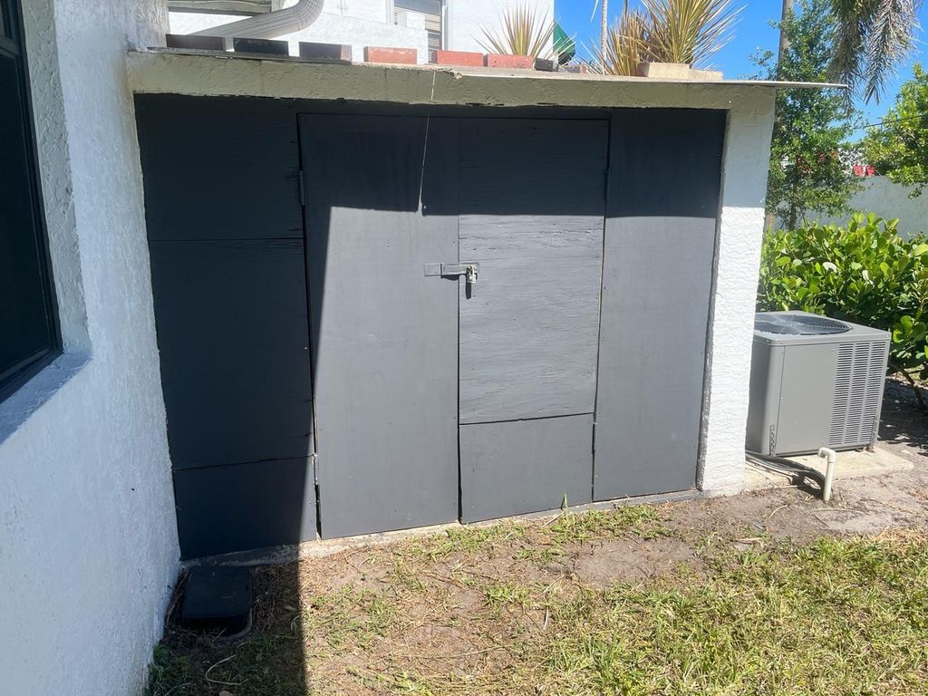 Photo of 283 NW 36th Avenue, Deerfield Beach, FL 33442 (MLS # B26029694)