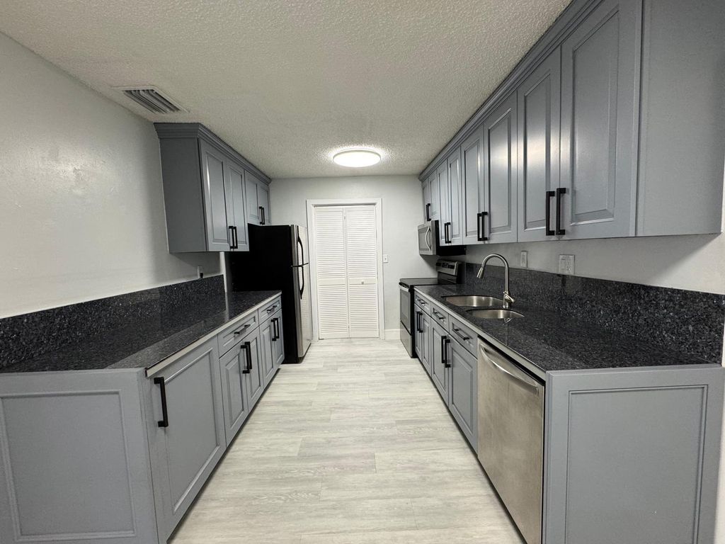 Photo of 6100 NE 4th Ave, Oakland Park, FL 33334 (MLS # F10539679)