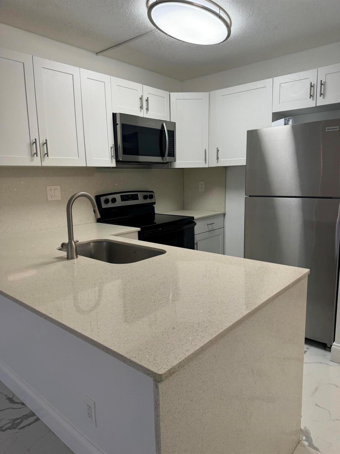 VOUCHERS WELCOMED! This stunning 1-bedroom, 1-bathroom condo in Coral Springs has just been completely renovated and is ready for its new tenant! Featuring a brand-new kitchen with sleek quartz countertops, and new stainless-steel appliances, this home combines comfort with contemporary style. The bathroom has been fully updated, and the entire unit has been freshly painted for a clean, crisp feel.No prior evictions and no pets allowed.Our landlord is committed to providing safe, clean, and affordable homes designed for long-term residents. If you're looking for a quality place to call home, look no further-this one won't last!