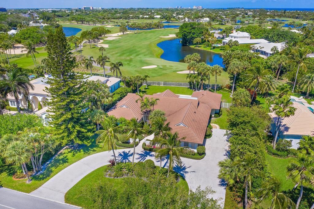 Photo of 831 Village Road, North Palm Beach, FL 33408 (MLS # R10701836)