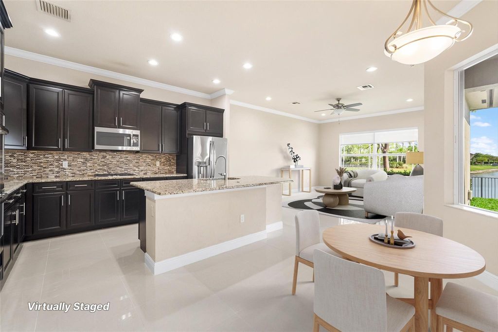 Photo of 8811 Miralago Way, Parkland, FL 33076 (MLS # F10443276)