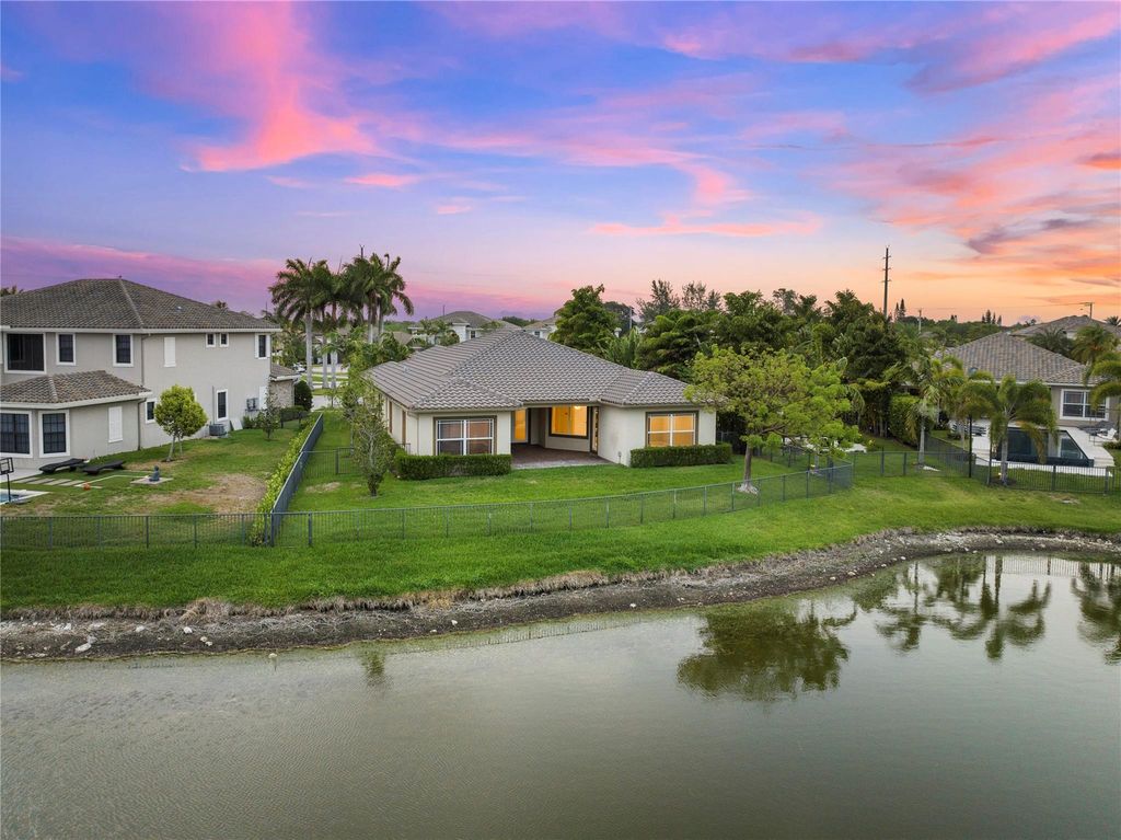Photo of 8811 Miralago Way, Parkland, FL 33076 (MLS # F10443276)