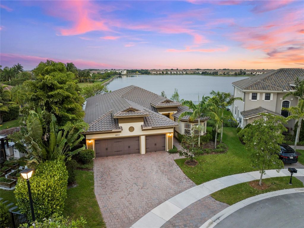 Photo of 8811 Miralago Way, Parkland, FL 33076 (MLS # F10443276)